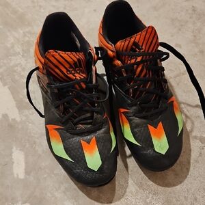 Adidas Black and Orange Cleats with Green Highlights